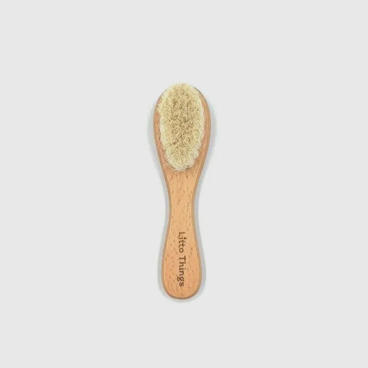 Soft natural goat hair brush for baby's delicate scalp
